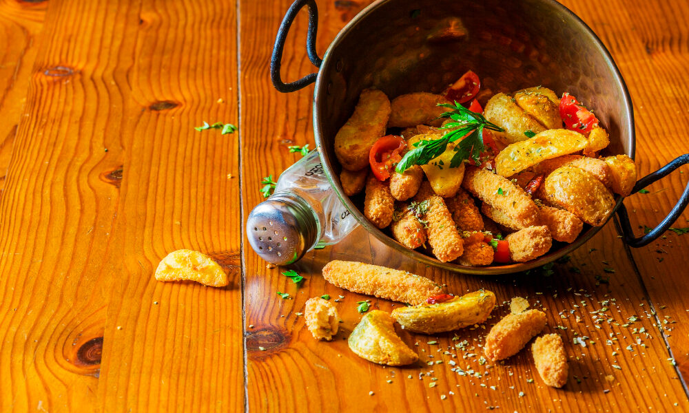 Дольки картофеля, запечённого со специями