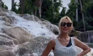 Кристина Орбакайте на фоне водопада