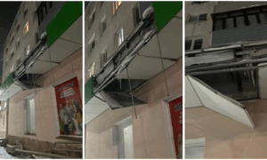 Козырек над магазином опасно сломан