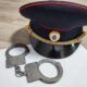 наручники и фуражка УМВД