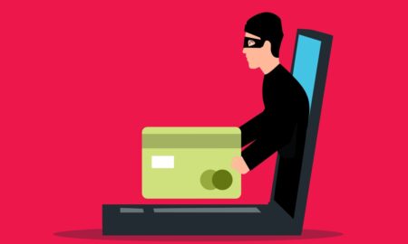 Иллюстрация с мошенником и банковской картой